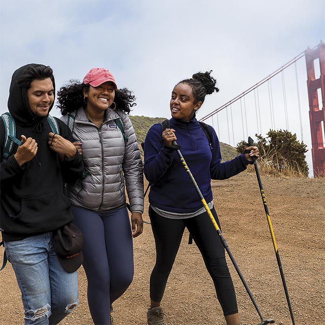 LINC high schoolers approaching the Golden Gate at the end of their trek.