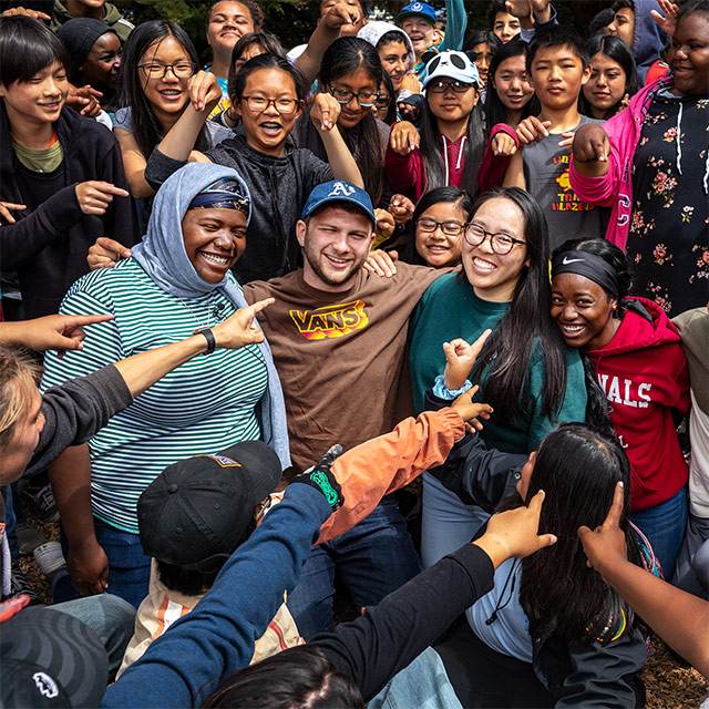 Participants shower program leaders with affection
at the Crissy Field Center in summer 2019.